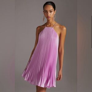 Pink pleated dress with a halter neckline. Never worn. Original price $445.